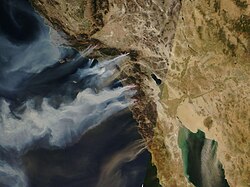 California wildfires affect the state yearly. The Santa Ana winds often expand fires and spread smoke over hundreds of miles.