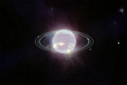 Neptune's rings and moons viewed in infrared by the James Webb Space Telescope, in 2022.