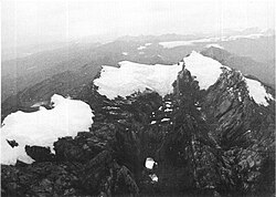 Puncak Jaya glaciers 1972. Left to right: Northwall Firn, Meren Glacier, and Carstensz Glacier. USGS. Also mid-2005 image and animation.