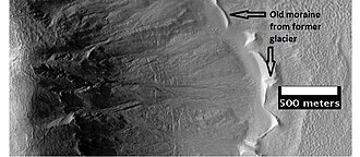 Gullies with remains of a former glacier in crater in Terra Sirenum, as seen by HiRISE under HiWish program.