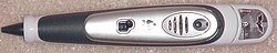 A typical Fly pen with a Batman Begins game cartridge