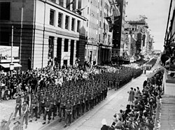 Returned World War II soldiers march in Queen Street, Brisbane, 1944