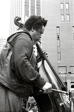 Mingus in 1976 playing the double bass