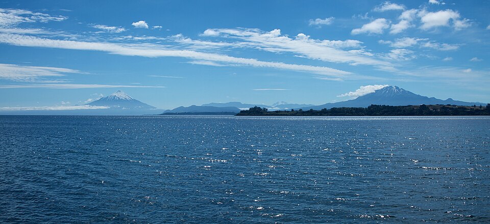 Panoramic from the city of the Llanquihue lake, Osorno and Calbuco volcanoes
