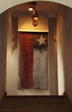 Time of Flags by the artist Ricardo Meza, located on the wall of the stairway access to the second floor of La Moneda Palace.