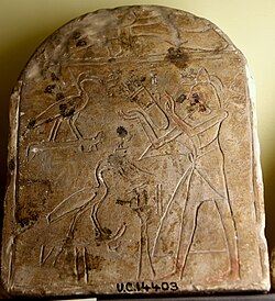 Worshipper before two ibises of Thoth. (early 19th Dynasty)