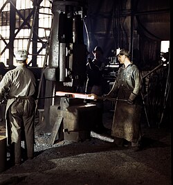 Blacksmiths at the Atchison, Topeka & Santa Fe Railway shops in Topeka, 1943