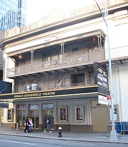 View of the auditorium facade, with fire escapes on it