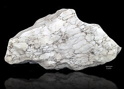 Hand sample of gypsum and anhydrite from diapir caprock showing "chicken wire" texture.