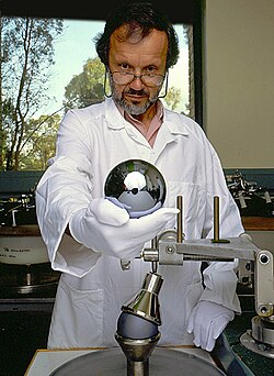 Silicon sphere for the Avogadro project used for measuring the Avogadro constant to a relative standard uncertainty of 2×10−8 or less, held by Achim Leistner[15]