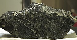 Serpentinized and carbonated peridotite[25]