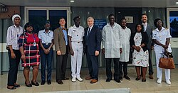 Osterholm, center, in 2019, during a visit to the Ghana Armed Forces United States Naval Medical Research Unit Three Molecular Lab.