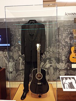 Cash's clothes and guitar on display at Artist Gallery of the Musical Instrument Museum of Phoenix in Phoenix, Arizona