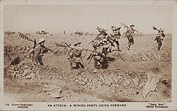 A wiring party deploying entanglements during World War I