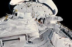 Checking the SIR-B antenna during STS-41-G