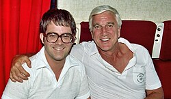 Collins with Leslie Nielsen in 1982
