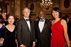 Ray Dalio at the International Achievement Summit's 2012 Banquet of the Golden Plate reception in Washington, D.C., with his wife, Barbara, and two American Academy of Achievement student delegates, Philip Thigo of Kenya and Julia Fan Li of Canada.