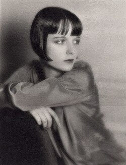 Studio portrait by Russell Ball, 1920s