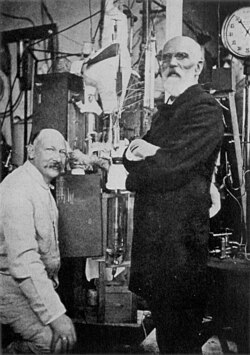 Heike Kamerlingh Onnes and Johannes van der Waals with the helium liquefactor at Leiden in 1908