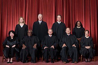 The Roberts Court (since June 30, 2022): Front row (left to right): Sonia Sotomayor, Clarence Thomas, Chief Justice John Roberts, Samuel Alito, and Elena Kagan. Back row (left to right): Amy Coney Barrett, Neil Gorsuch, Brett Kavanaugh, and Ketanji Brown Jackson.
