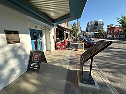 A plaque (on sidewalk, right) in Saskatoon commemorates the spot on Broadway Avenue where she made her first professional performance in 1962 at the Louis Riel coffeehouse.