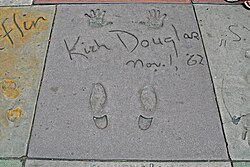His handprints and footprints at Grauman's Chinese Theatre