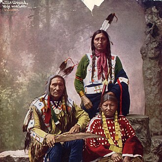 Chief Little Wound with his wife and son, 1899