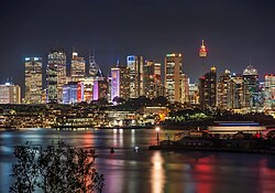 Sydney's financial district at night. Throughout the Great Recession, the Australian economy remained resilient and stable.[119][120]