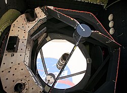 The NASA logo reflected in SOFIAs 2.5-meter primary mirror.
