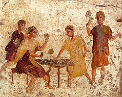 Ancient fresco of dice players in Pompei