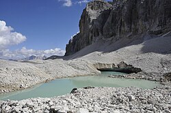 Scree-covered glacier, Lech dl Dragon, Italy