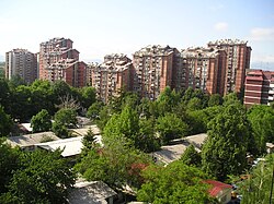 Kapištec neighbourhood, developed during the 1970s. Some post-earthquake prefabricated houses can be seen in the foreground.