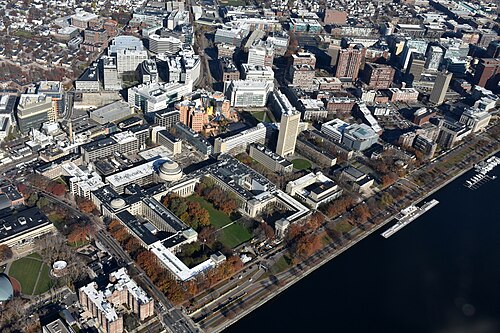 MIT's central campus from above the Harvard Bridge. Left of center is the Great Dome, with the Stata Center and Kendall Square behind.