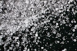 Sodium chloride is formed through the redox reaction of sodium metal and chlorine gas