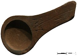 17,000 yr old sandstone oil lamp discovered at the caves of Lascaux, France