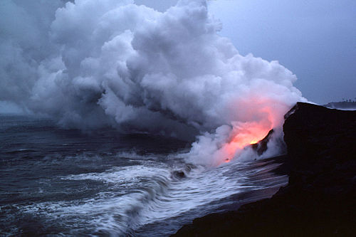 A littoral cone lies on the right, on top of the cliffs