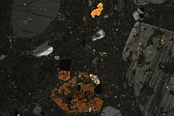 Photomicrograph of andesite in thin section (between crossed polarizers)