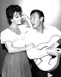 West with Anita Sands in a 1961 publicity photo for The Detectives