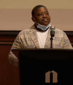MacDowell Fellow Erika Renee Land performing at the Newberry Library in Chicago during the Surviving The Long Wars Triennial