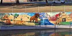 The southern terminus of the Great Wall features Prehistoric California, labelled as 20,000 BC, a Columbian mammoth getting trapped in the La Brea Tar Pits, and the earliest evidence of Chumash settlement, labelled as 1,000 AD