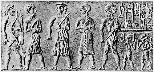 Cylinder seal of the scribe Kalki, showing Prince Ubil-Eshtar, probable brother of Sargon, with dignitaries (an archer in front, the scribe holding a tablet following the Prince, and two dignitaries with weapons).[53]