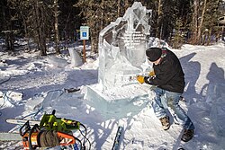 Carving an ice sculpture