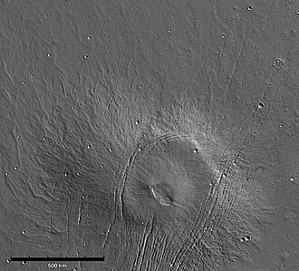 Lava flows extending north and northwest of Alba Mons. The sinuous ridges are tube- and channel-fed flows. Faint, degraded flows and ridges in the north are part of Alba's broad lava apron (MOLA).