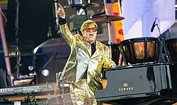 John performing during his Glastonbury Festival 2023 show