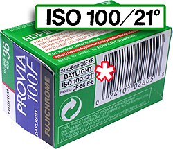 This film container denotes its speed as ISO 100/21°, including both arithmetic (100 ASA) and logarithmic (21 DIN) components. The second is often dropped, making (e.g.) "ISO 100" effectively equivalent to the older ASA speed. (As is common, the "100" in the film name alludes to its ISO rating.)
