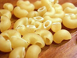 Elbow macaroni is an extruded hollow pasta.