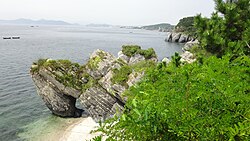 Tunnel-like structures formed by erosion in Jinshitan Coastal National Geopark, Dalian, Liaoning Province, China