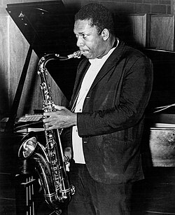 Coltrane playing saxophone