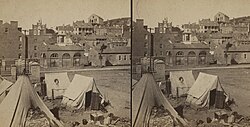 Stereoscopic picture of contraband camp at Harpers Ferry, about 1861, with John Brown's Fort in background