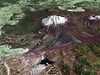 A composite satellite image looking west across Ruapehu, with the older eroded volcano Hauhungatahi visible behind it, and the cone of Ngauruhoe visible to the right.